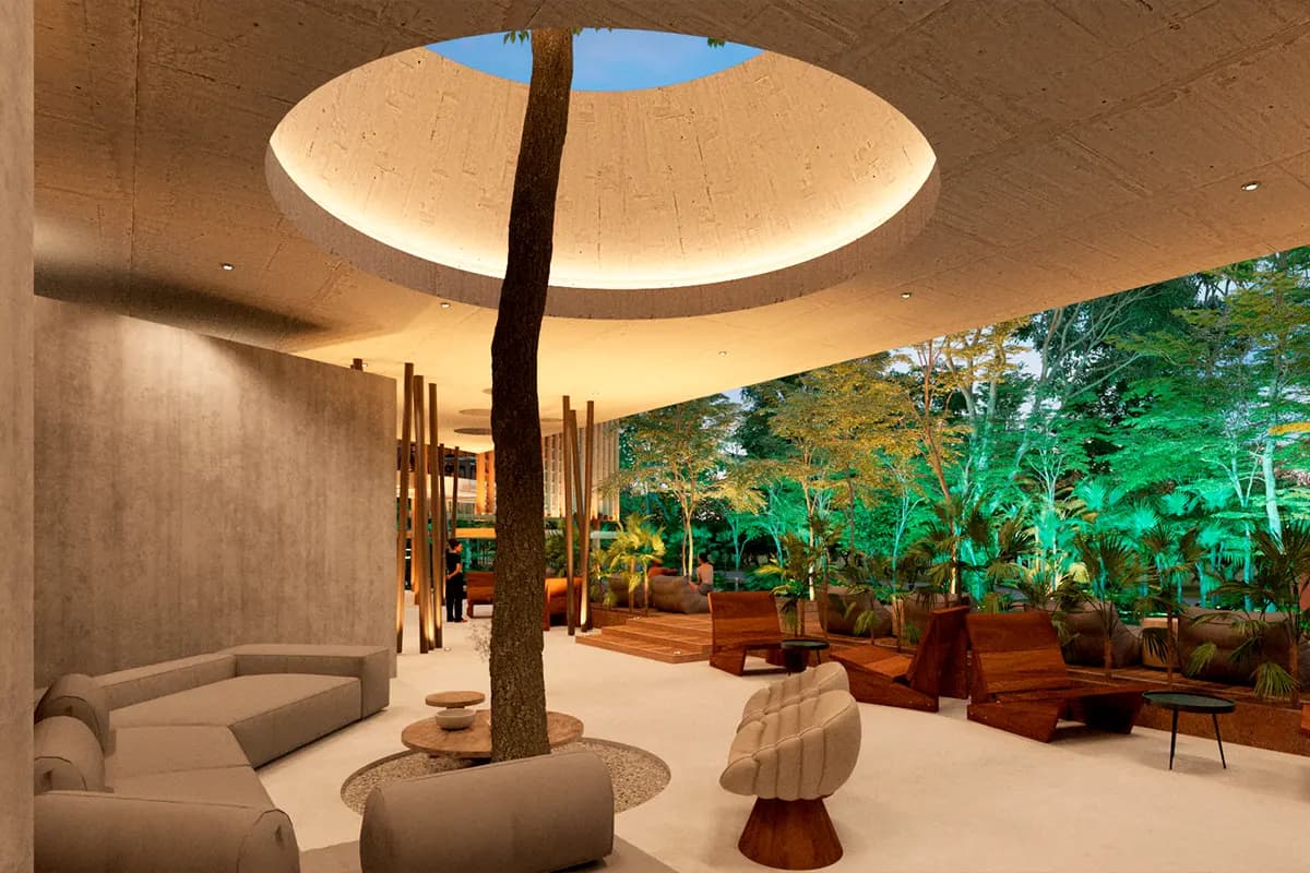 Puerto 369 — lobby con arbol y oculo